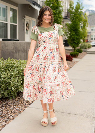Coral flowers on the floral dress