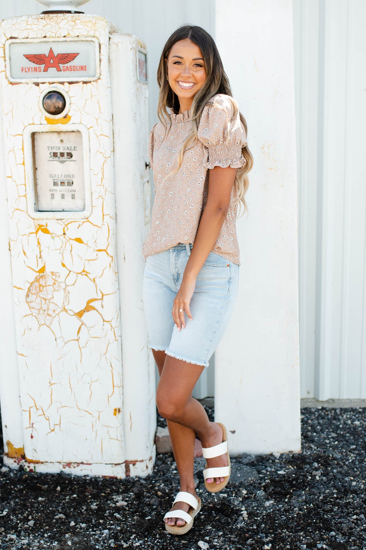Short sleeve taupe floral top with full sleeves and a ruffle at the neck