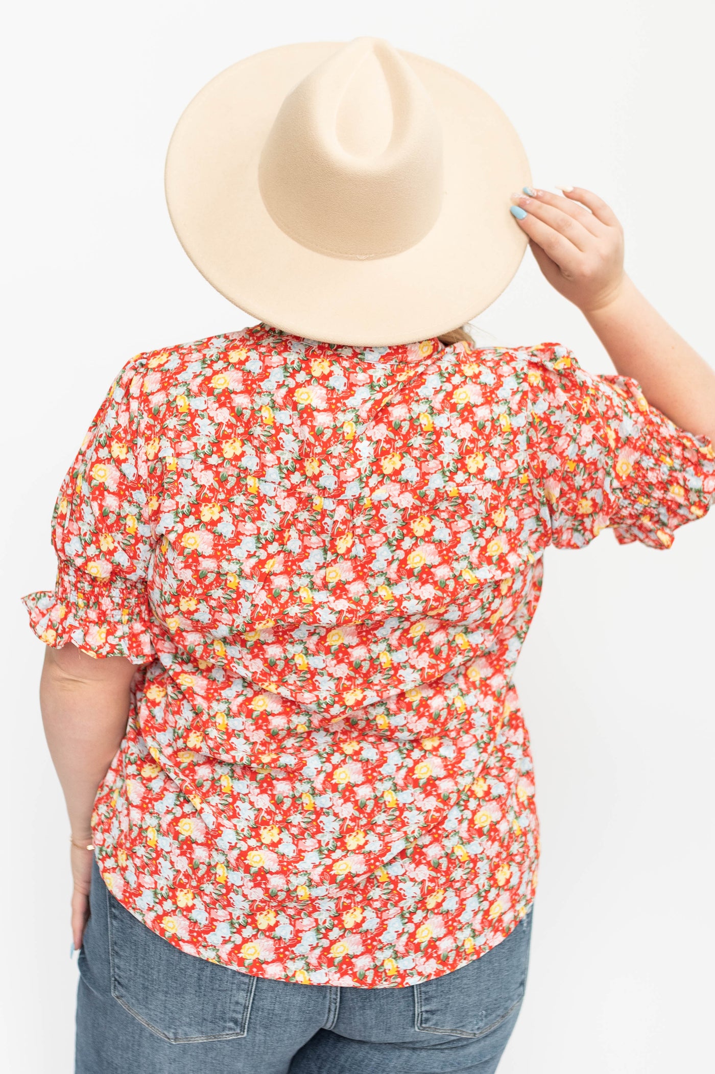 Plus size red floral short sleeve top.