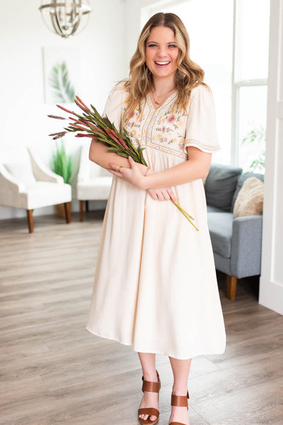 Cream embroidered dress with short sleeves
