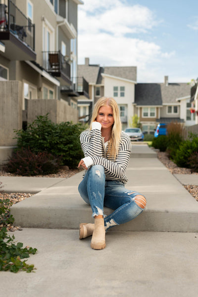 Long sleeve navy striped top with white trim