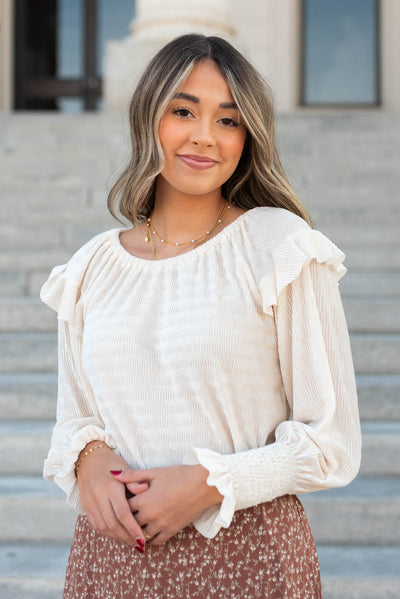 Cream ribbed ruffle blouse