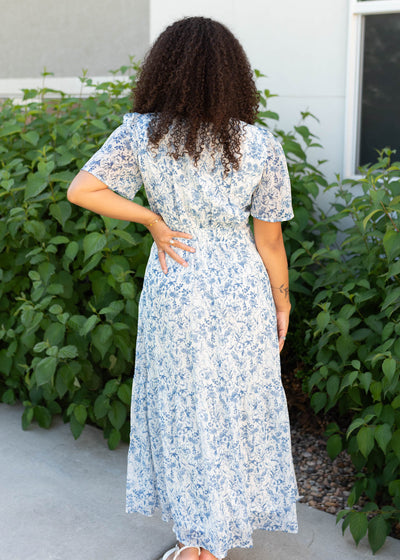 Back view of the blue floral dress