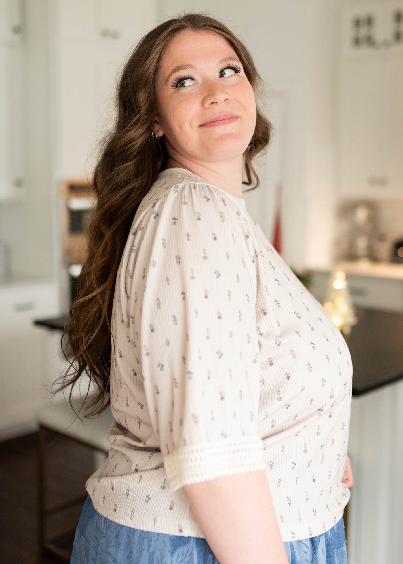 Side view of the cram floral top in plus size by Lena & Lou