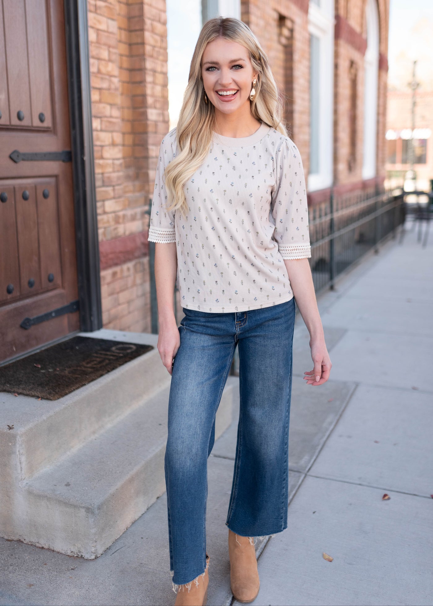 Short sleeve cream floral top with lace cuffs by Lena & Lou