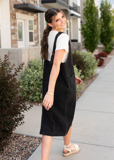 Black denim overall dress with side pockets