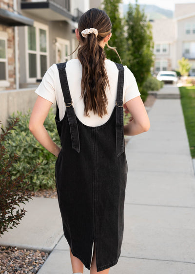 Back view of the black denim overall dress