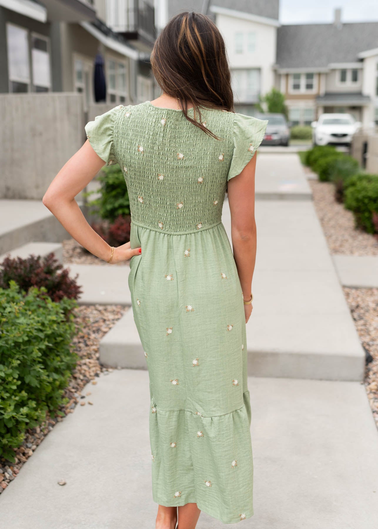 Back view of the olive floral embroidered dress