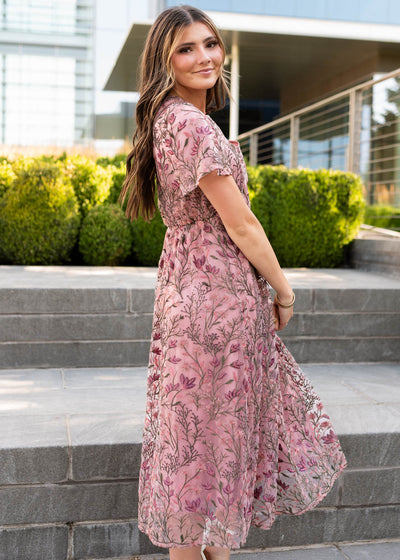 Side view of the antique pink embroidered dress