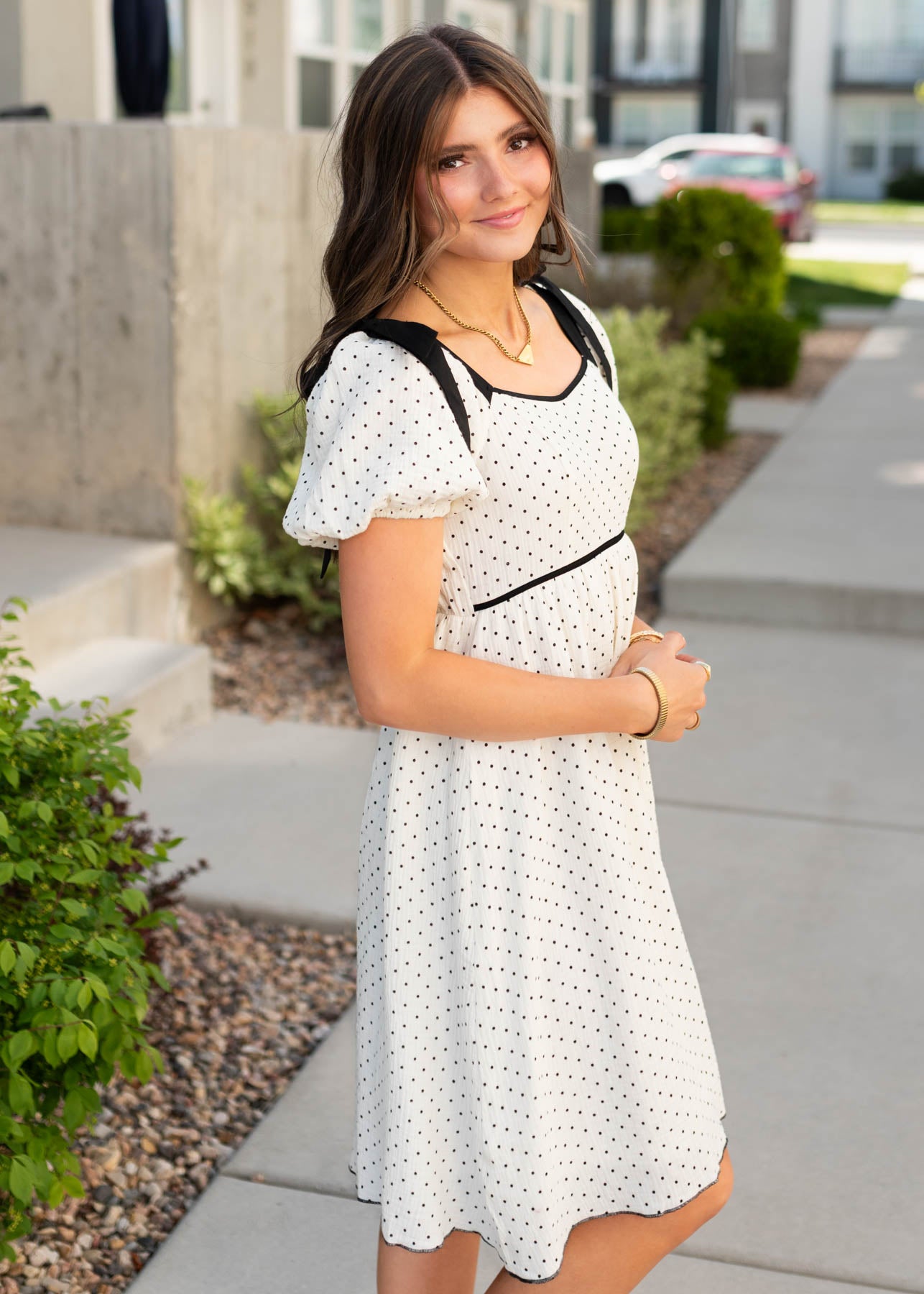 Side view of the ivory polka dot dress