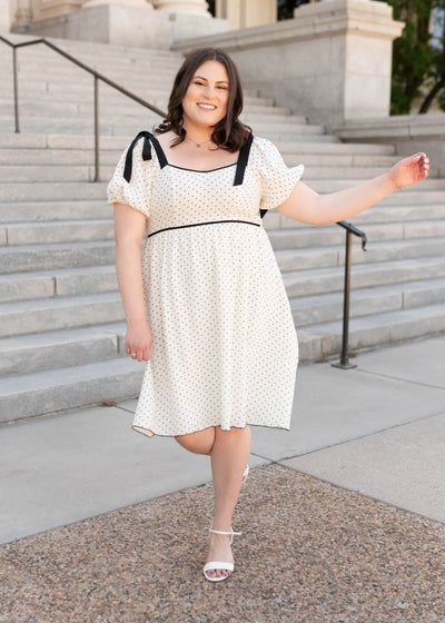 Plus size ivory polka dot dress with short sleeves