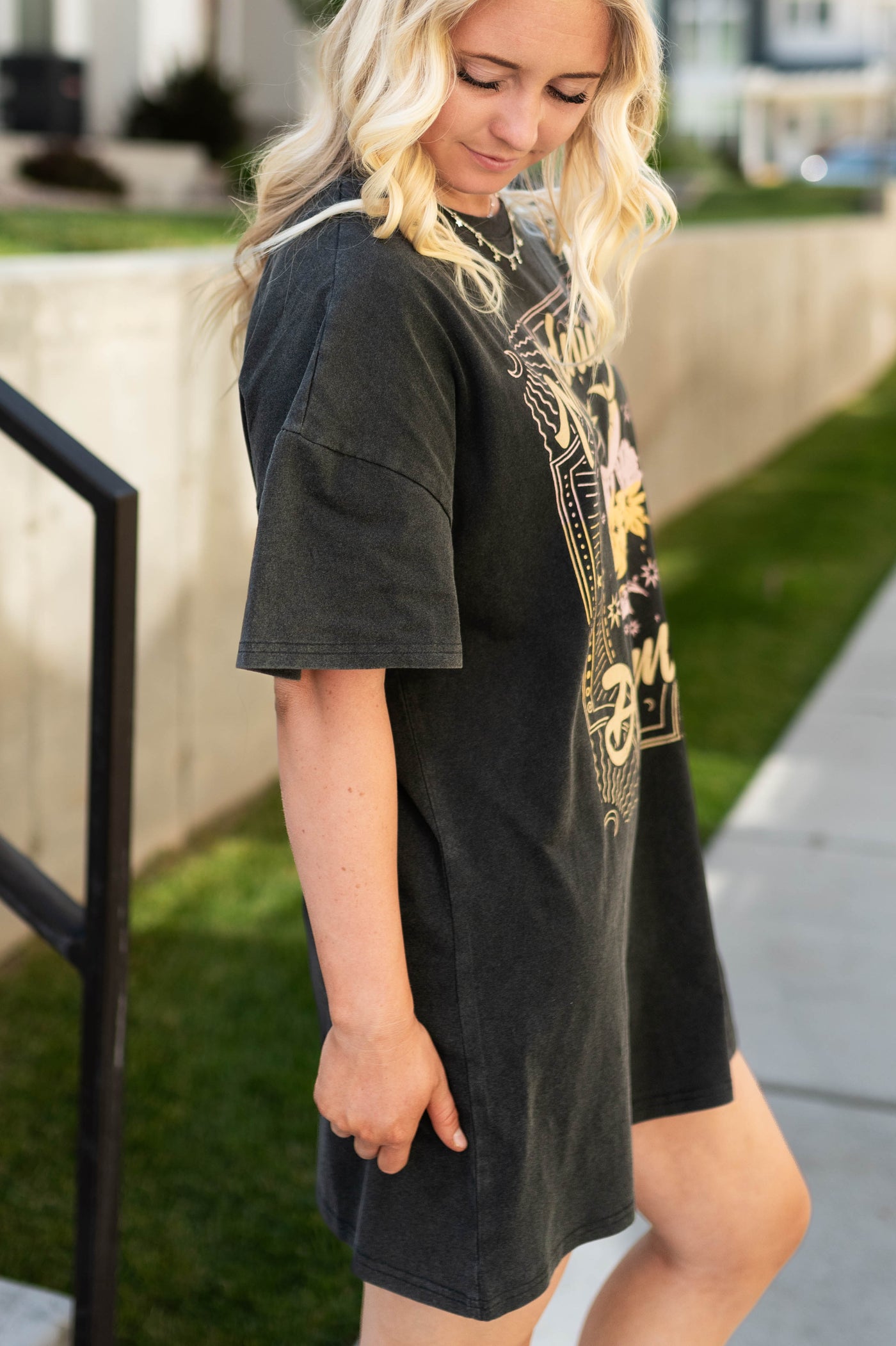 Side view of a black t-shirt dress