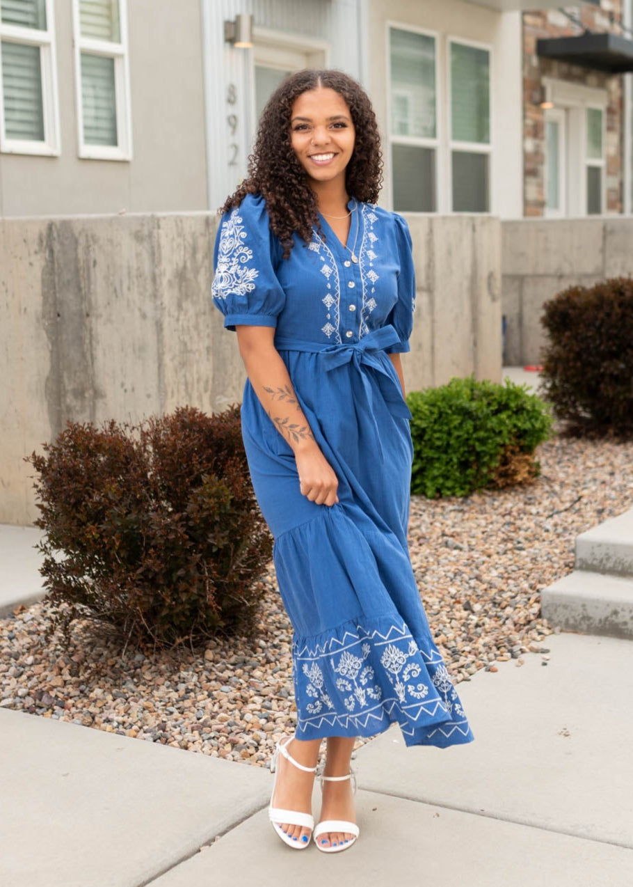 Tie at the waist on the blue embroidered dress
