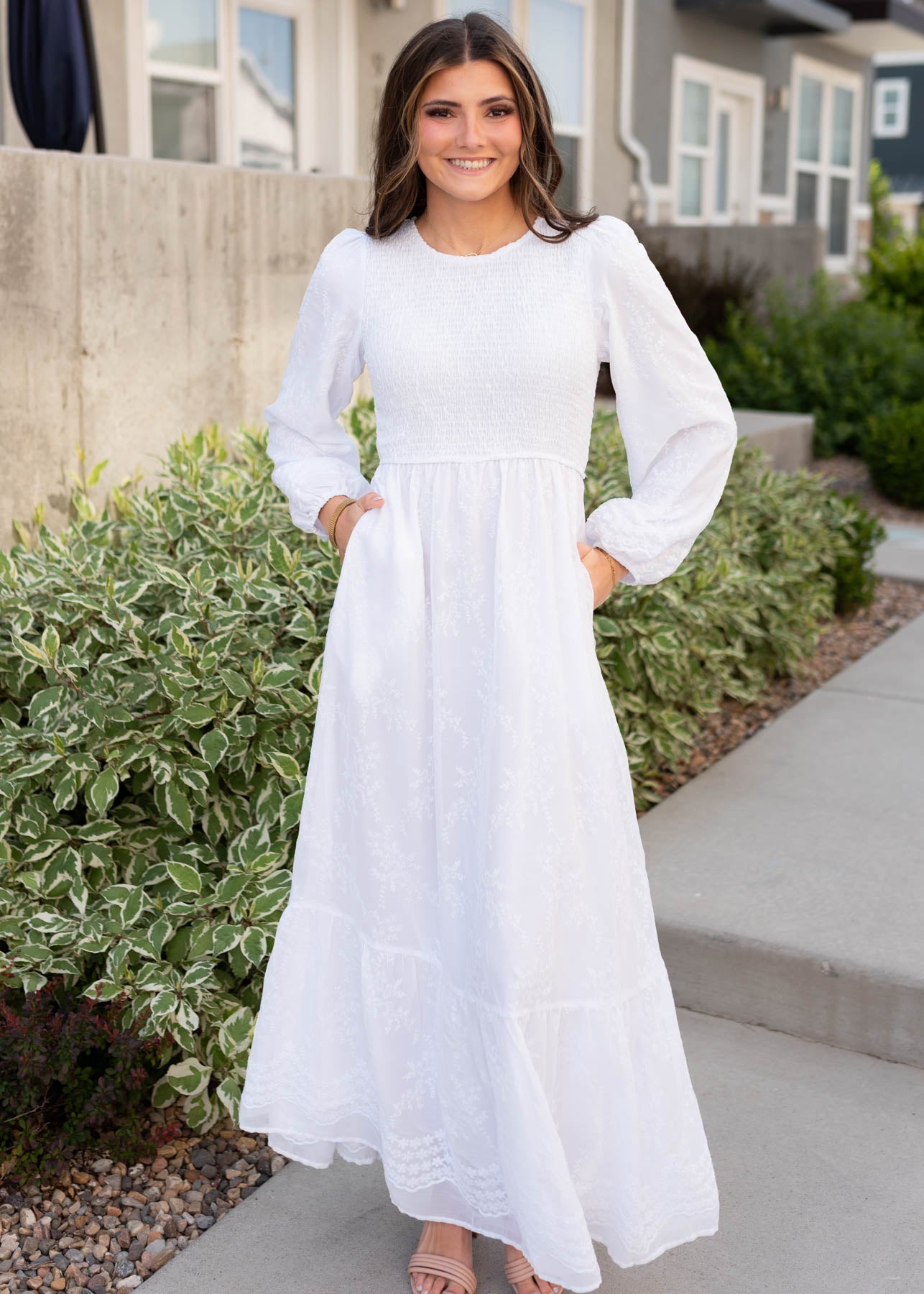 Long sleeve white smocked dress with pockets