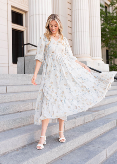 Cream flower dress with a v-neck