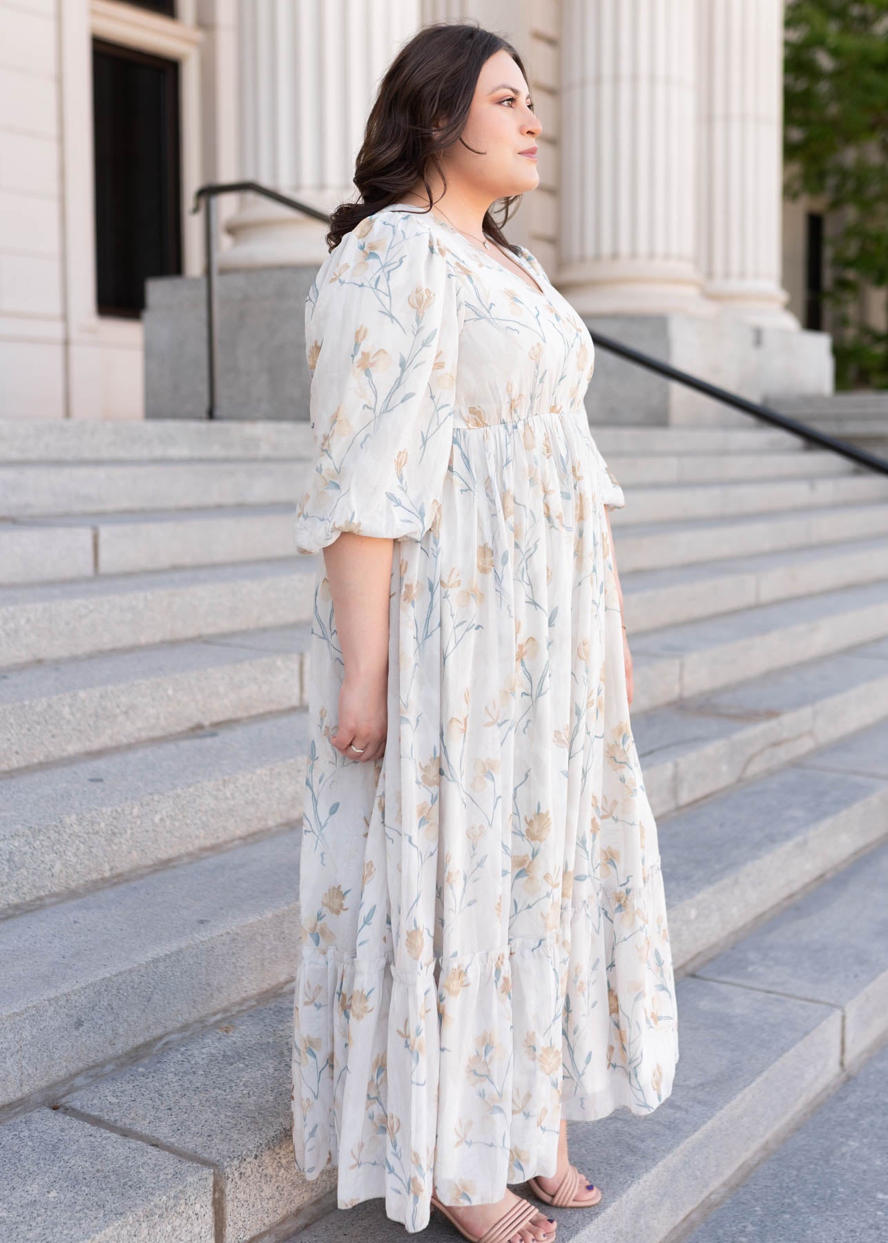 Side view of the plus size cream flower dress