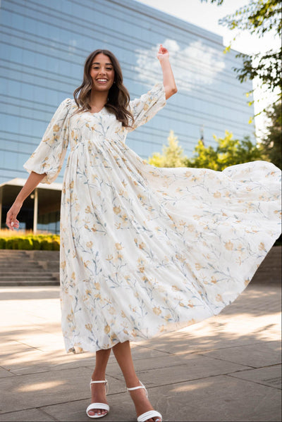 Cream flower dress with a v-neck