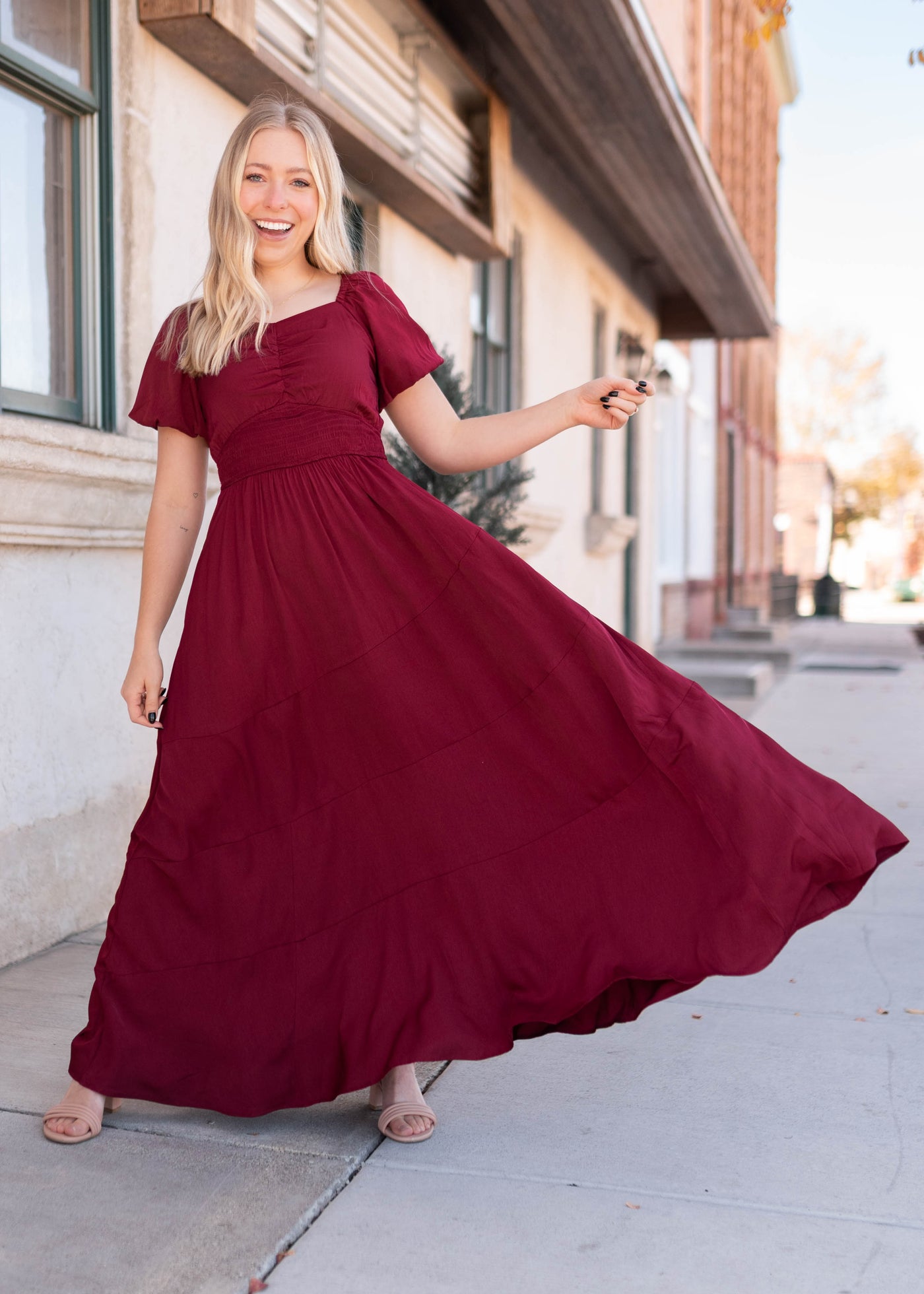 Sweetheart neck on the burgundy smocked dress with short sleeves