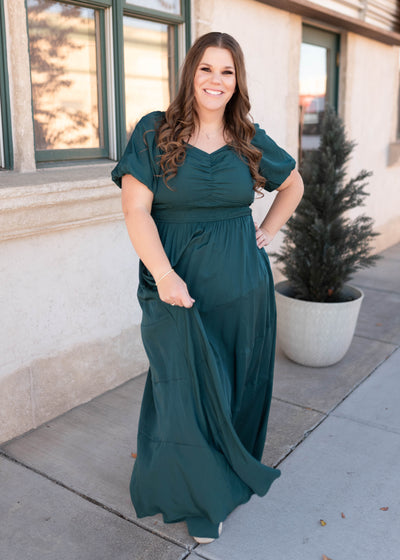 Maxi length green smocked dress with smocking around the waist in plus size