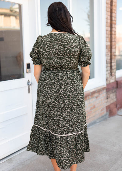 Back view of the dark olive floral dress