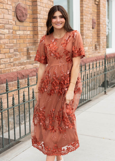 Modest rust floral dress with short sleeves sold at Lena Layne