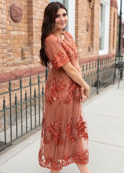 Side view of the rust floral dress 