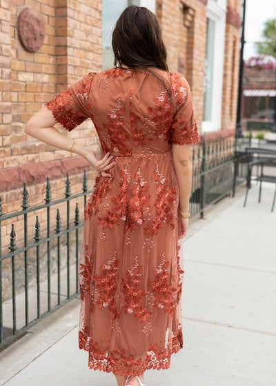 Back view of the rust floral dress at Lena Layne