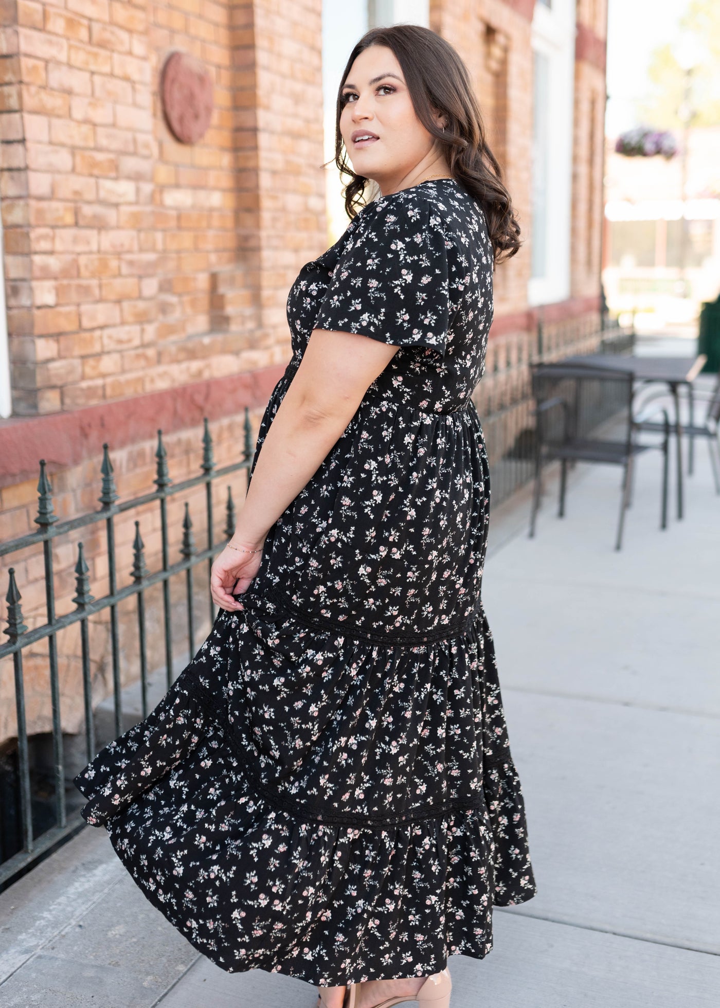 Side view of the black floral dress in plus size