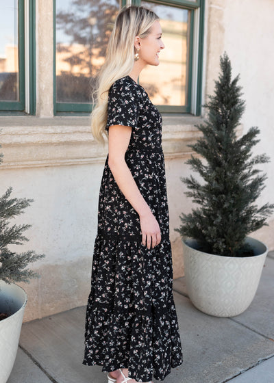 Side view of the short sleeve black floral dress by Lena & Layne