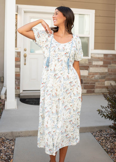 Modest wide v-neck white ribbon pattern dress with blue bows