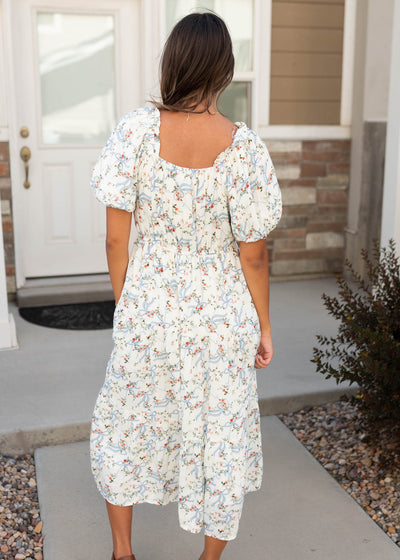 Back view of the modest white ribbon pattern dress