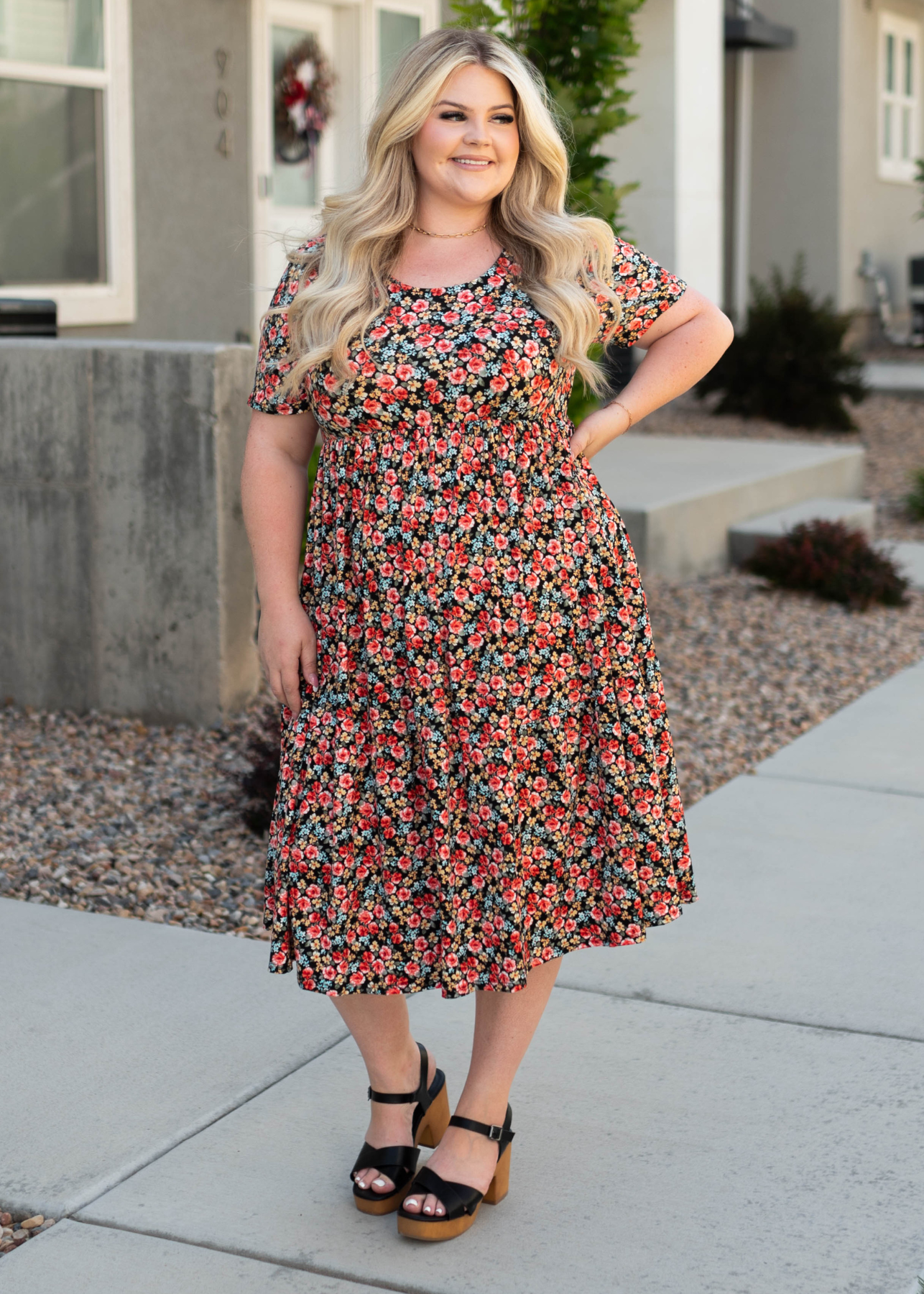Plus size black dress with red flowers