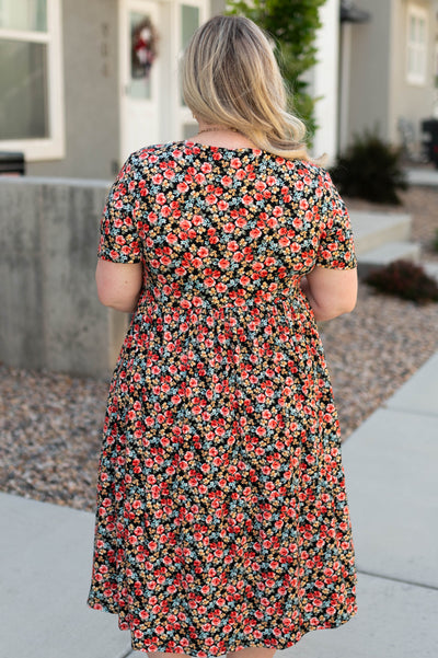 Back view of a plus size black dress