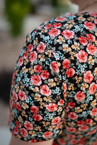 Sleeve of a black dress