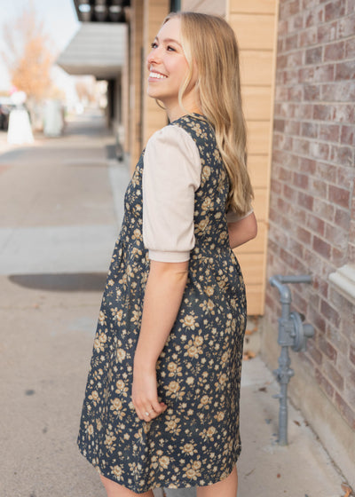 Side view of the navy floral denim dress