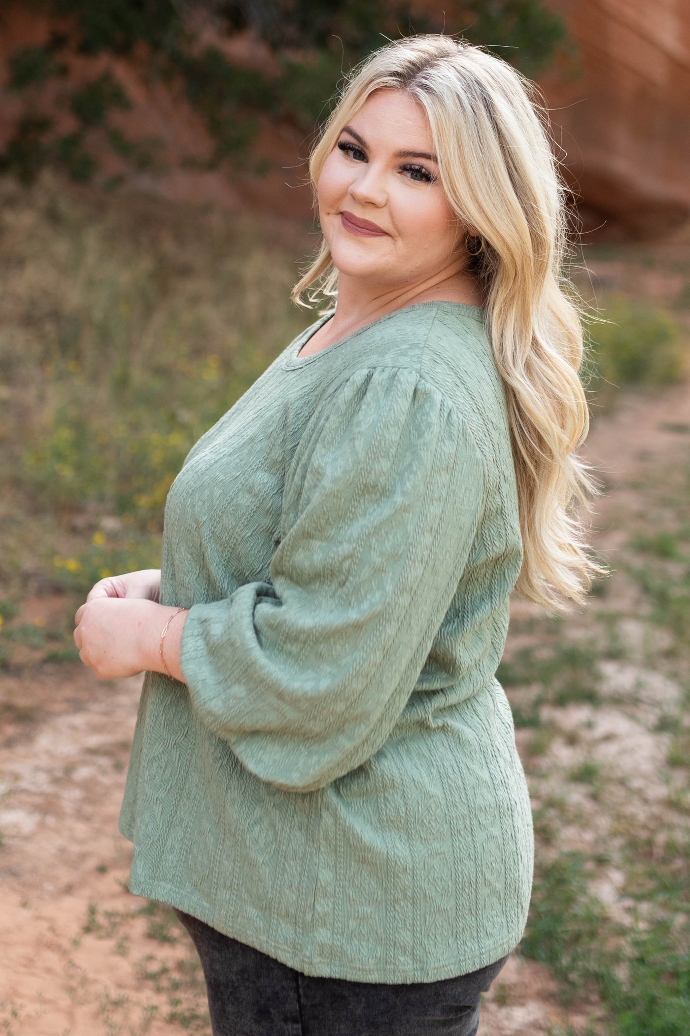 Side view of a sage top