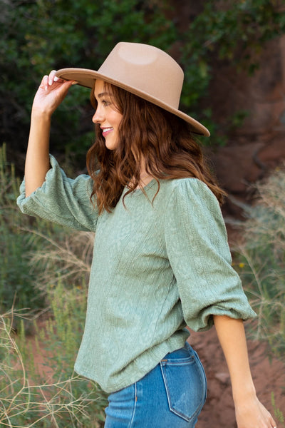 Side view of a sage top