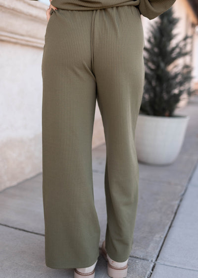 Back view of the olive textured pants
