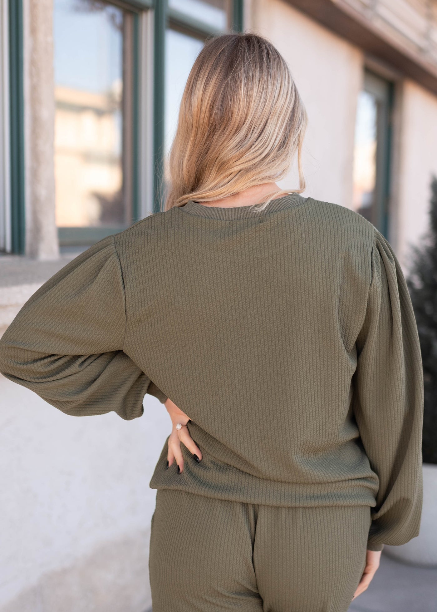 Back view of the olive textured pullover