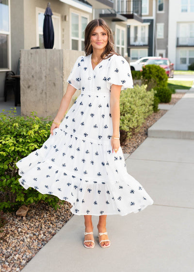 White embroidered dress with tiered skirt