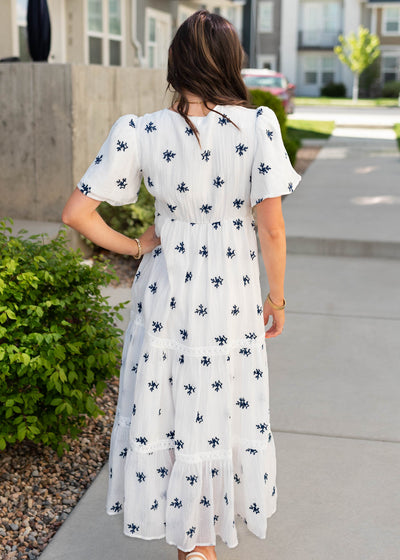Back view of the white embroidered dress