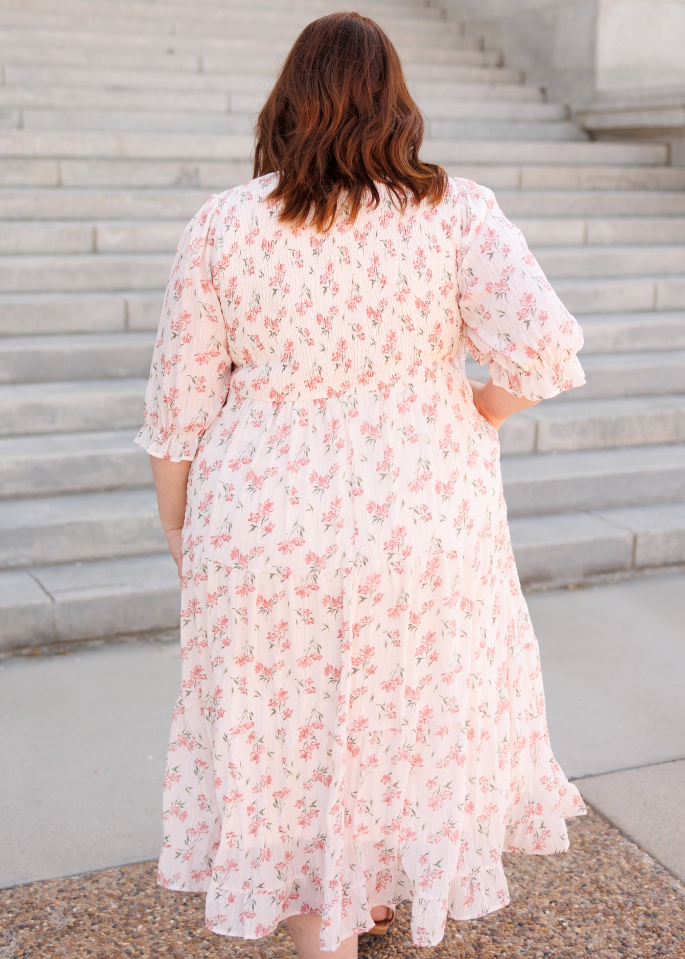 Back view of the pink floral tiered dress