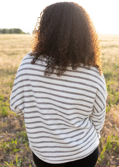 Back view of a stripe heather gray top