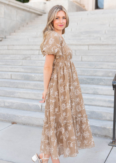Side view of the light mocha embroidered dress
