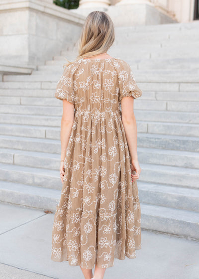 Back view of the light mocha embroidered dress