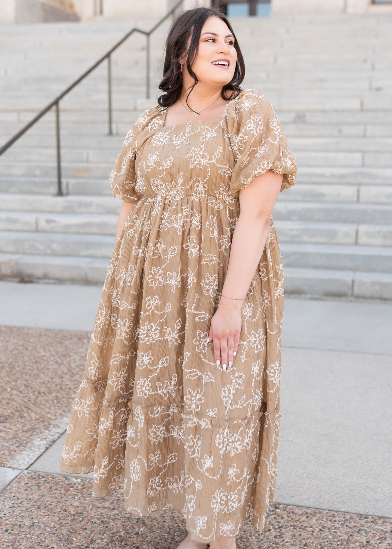 Plus size light mocha embroidered dress with a ruffle at the hem