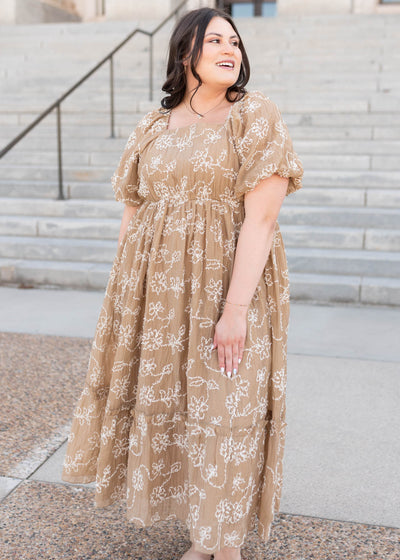 Plus size light mocha embroidered dress with a ruffle at the hem