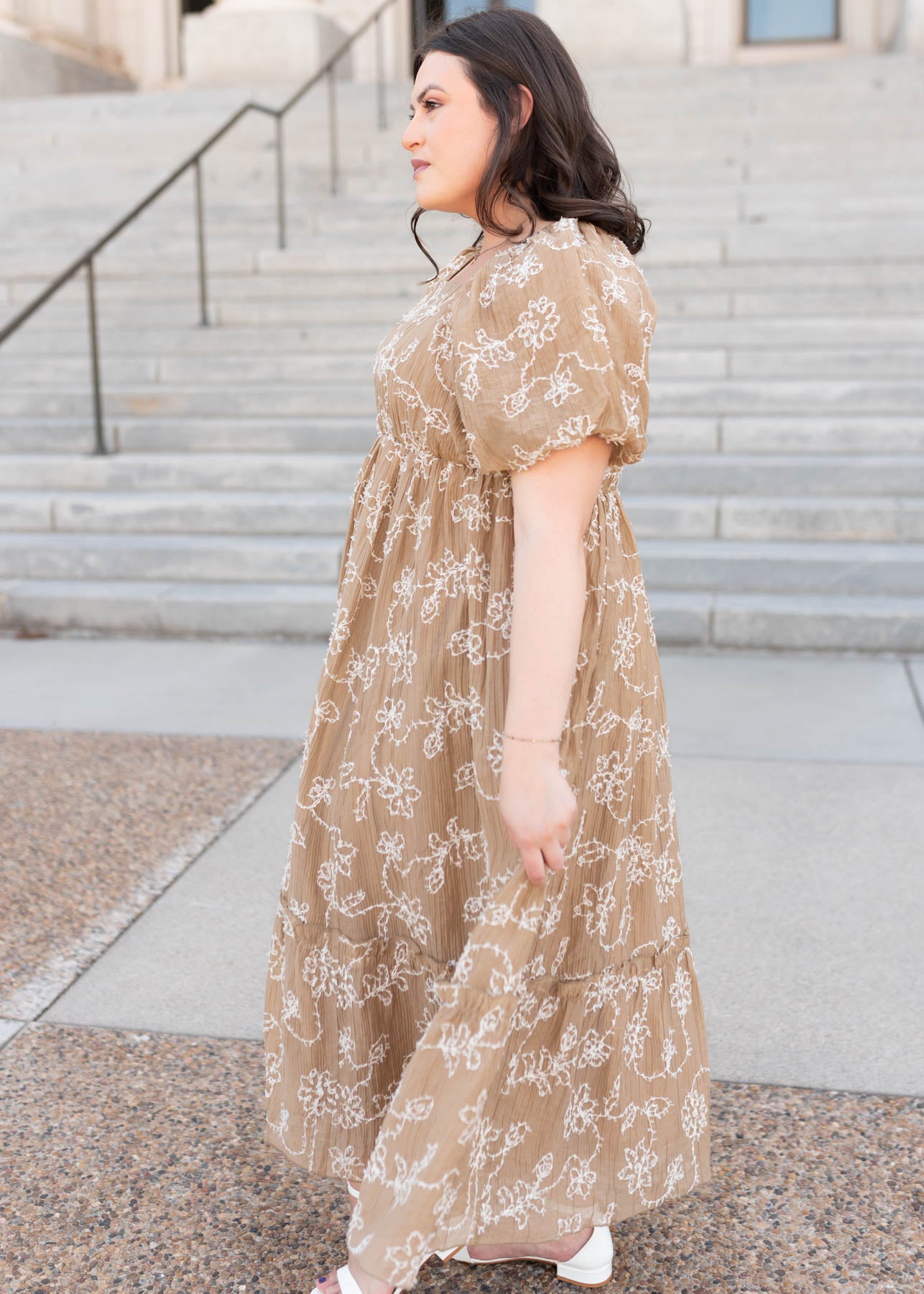 Side view of the light mocha embroidered dress in plus size