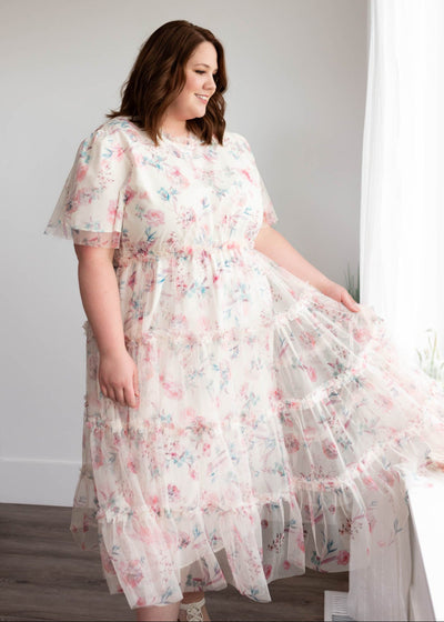Tiered skirt on the plus size on the pink floral mesh dress