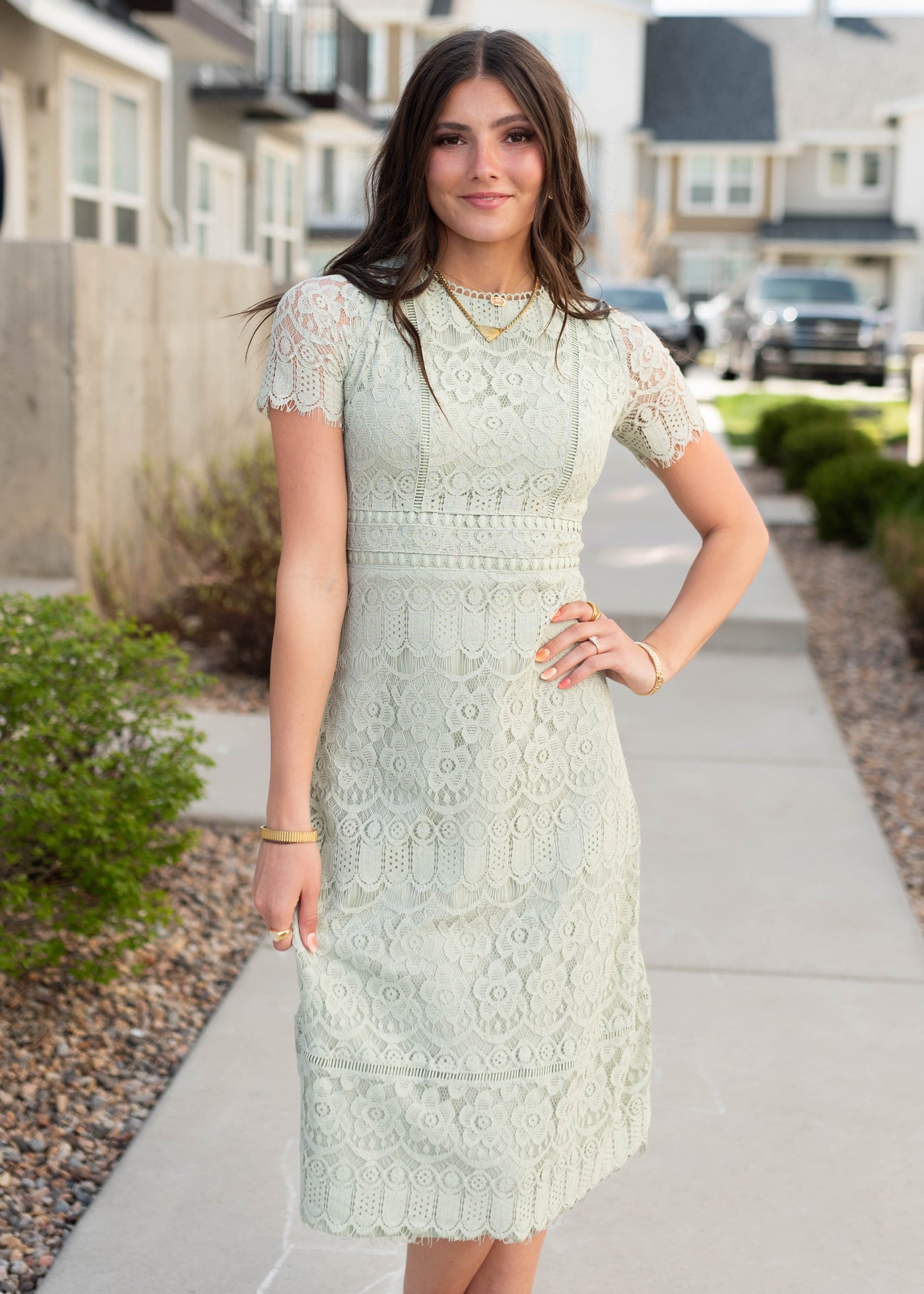 LIght sage lace dress with a zip up back